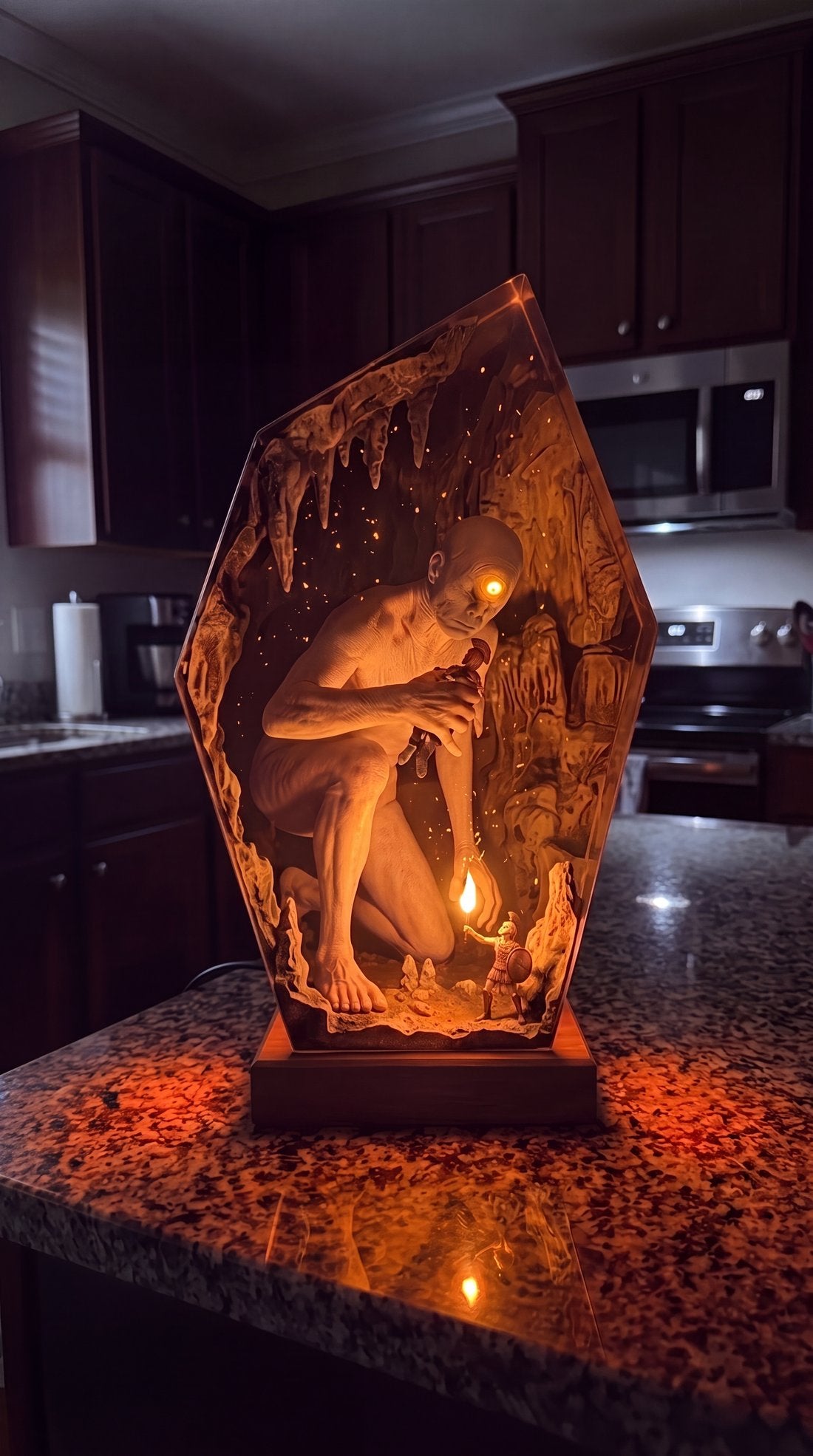 Handmade Helios Odyssey resin lamp glowing in the dark
