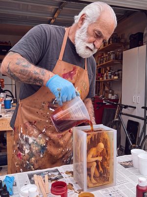 Resin being poured into a lamp mould